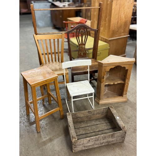 213 - A George III oak side chair, a pine corner cupboard, crate, a stool and two chairs