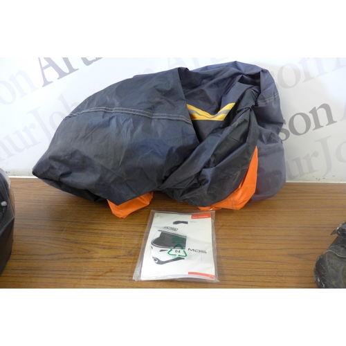 5250 - A protective motorcycle cover, an MDS motorcycle helmet, a pair of boots and a pair of gloves