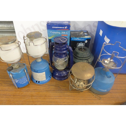 5255 - A large quantity of camping equipment including Camping Gaz butane gas lamps, a Coleman electronic c... 