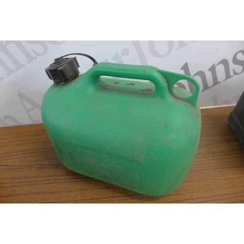 5285 - 4 plastic petrol canisters