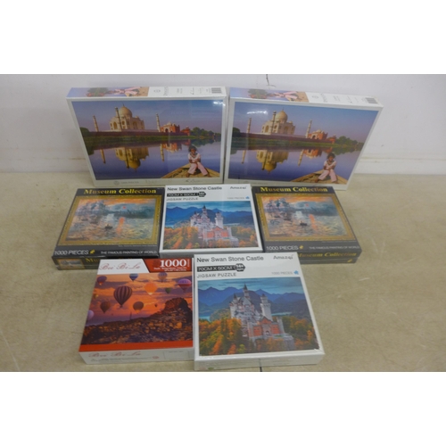 5326 - 7 assorted 1000 piece jigsaw puzzles, sealed