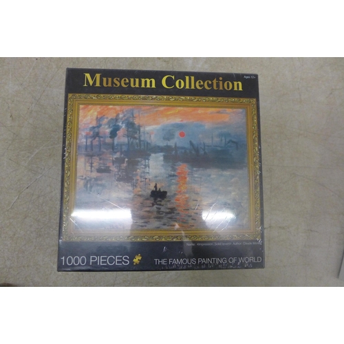 5326 - 7 assorted 1000 piece jigsaw puzzles, sealed