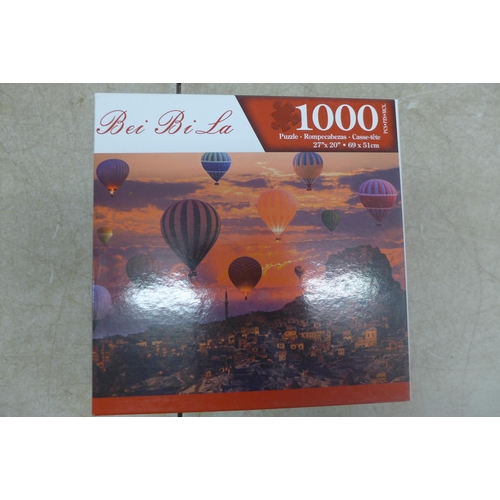 5326 - 7 assorted 1000 piece jigsaw puzzles, sealed