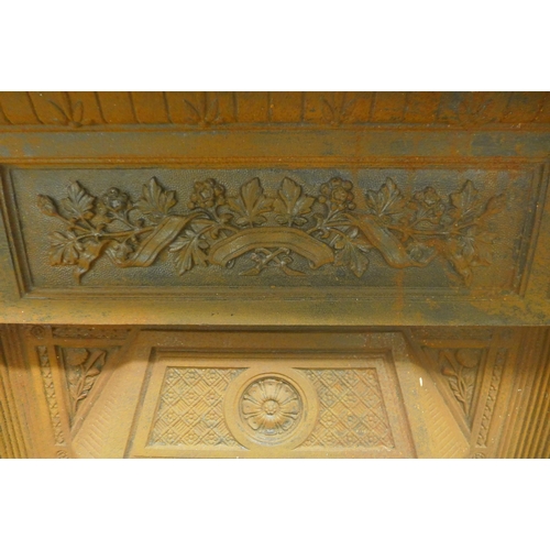 5355 - A Victorian Aesthetic Movement cast iron fire surround