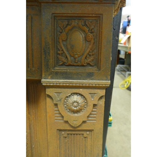 5355 - A Victorian Aesthetic Movement cast iron fire surround