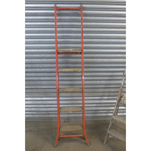 5150 - Two metal step ladders and a wooden step ladder