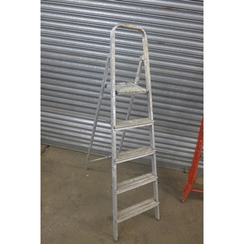 5150 - Two metal step ladders and a wooden step ladder