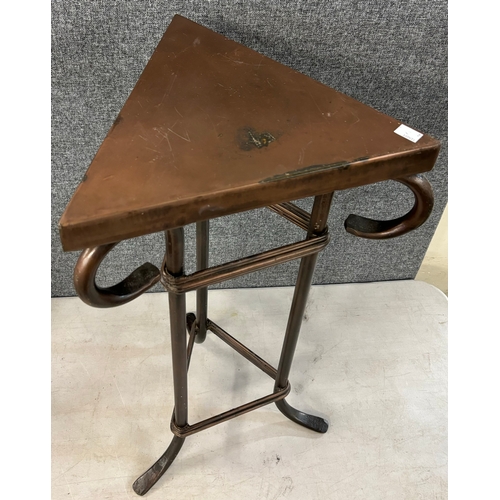 233A - A wrought metal triangular occasional table