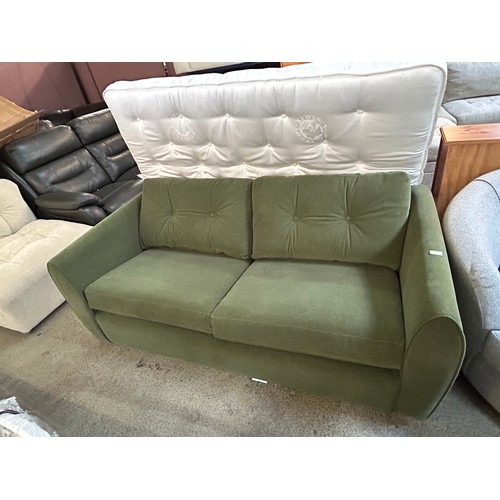 3202 - A forest green upholstered three seater sofa bed with mattress(sofa bed mechanism requires attention... 