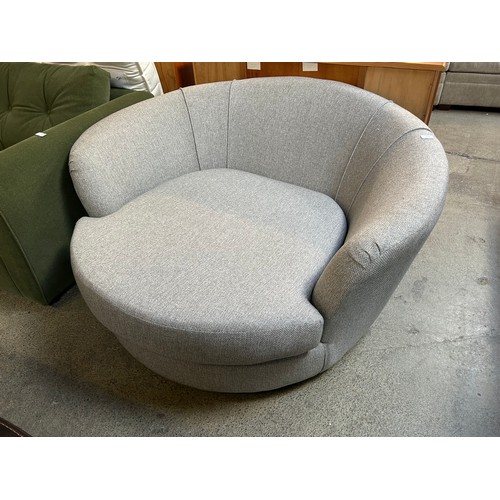 3201 - A grey hopsack swivel love seat (no back cushion)