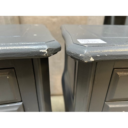 3221 - A pair of grey bedside tables