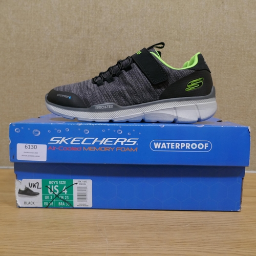 6130 - A pair of Boy's Black and Green Skechers trainers, Size UK2 (345-698) *This lot is subject to Vat