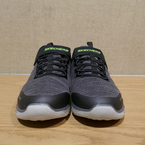 6130 - A pair of Boy's Black and Green Skechers trainers, Size UK2 (345-698) *This lot is subject to Vat