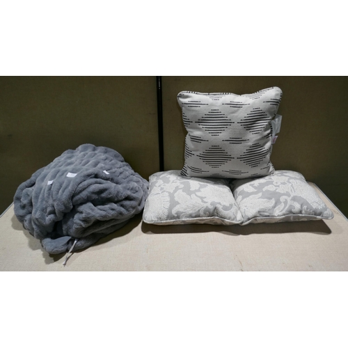 6043 - Textured Fur Throw and three cushions (345-534) *This lot is subject to Vat