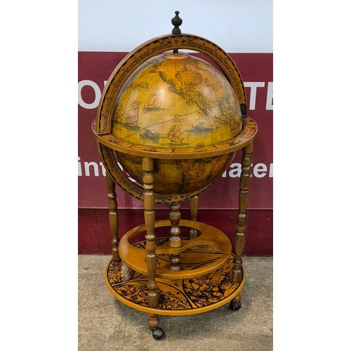 9 - An Italian terrestrial globe cocktail cabinet/trolley