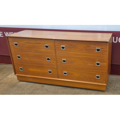 13 - A Danish teak chest of drawers