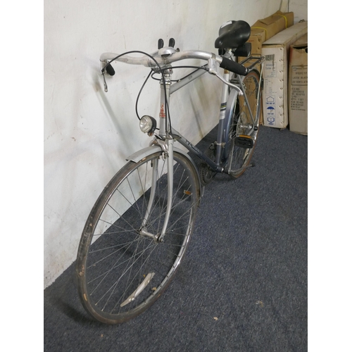 8063 - A Raleigh Nova high tensile steel tube framed road bike with mud guards and pannier rack