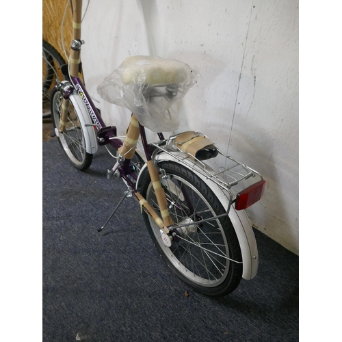 8095 - A Universal Cycles M252 Stowaway folding city bike