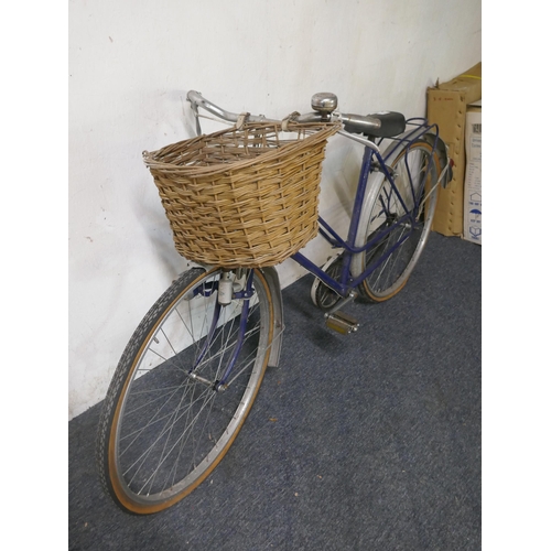 8118 - A vintage Step Through framed bike with mud guards, front basket and pannier rack