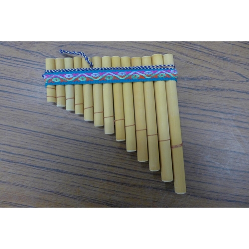 5106 - 6 Peruvian 13-note pan pipes, unused