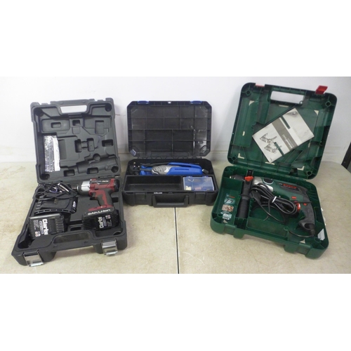 5009 - 3 cased tools - a Clarke CIR18LIC 2AH cordless impact driver with two batteries and charger, a Dreme... 