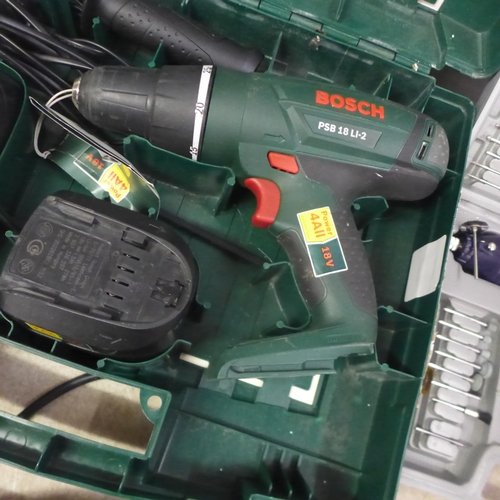 5011 - A Bosch PSB18 Li-2 cordless drill, a 60 piece rotary tool kit and a Dremel 3000 rotary tool