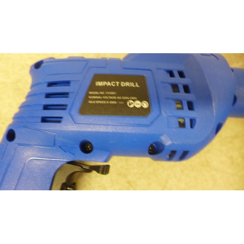 5019 - A 240V hand impact drill with a chainsaw attachment, both unused