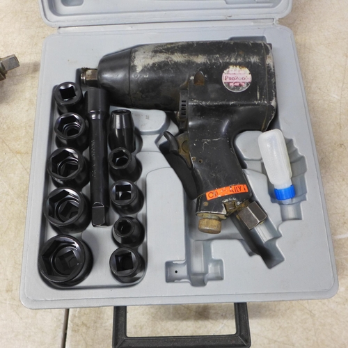 5031 - A Pro 2000 impact driver with sockets in case and a GP impact driver