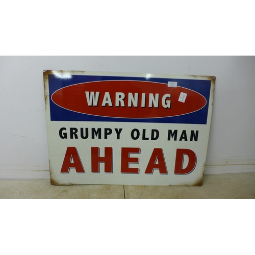 5077 - A metal warning sign - 