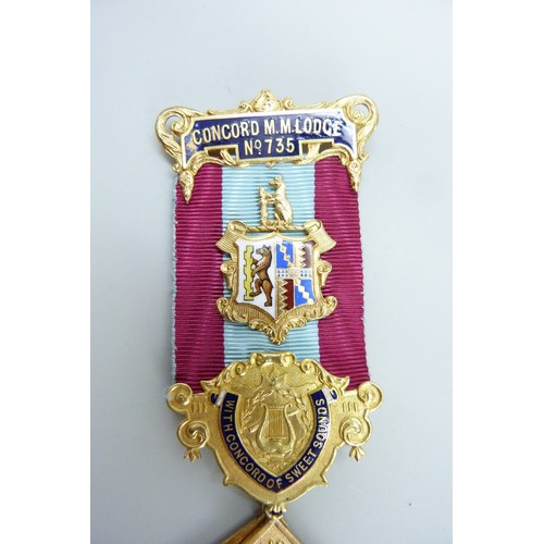 9001 - A 9ct yellow gold enamelled masonic medal, Concord M.M. Lodge No.735, total weight 39.4g (2005 added... 