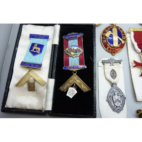 9025 - A very large collection of masonic medals, including three silver examples