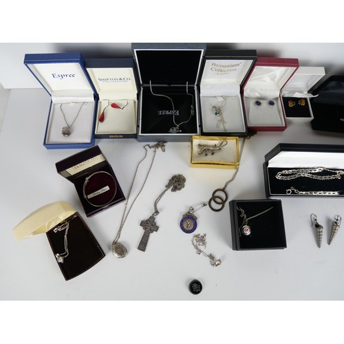 9029 - A large collection of silver and white metal jewellery