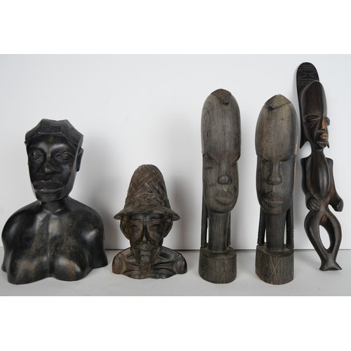 9056 - A collection of five African carvings