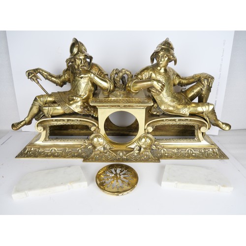 9057 - A brass centrepiece with two reclining knights, missing clock