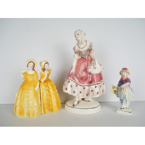 9071 - Four Katzhutte porcelain figures including bookends