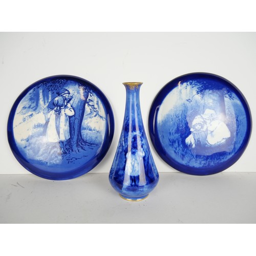 9072 - Two Royal Doulton Blue Children Seriesware plaques and a Royal Doulton Blue Children vase (a/f)