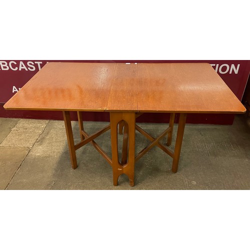 38 - A Jentique teak drop-leaf table