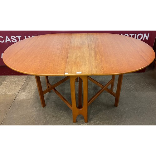 51 - A Jentique teak drop-leaf table