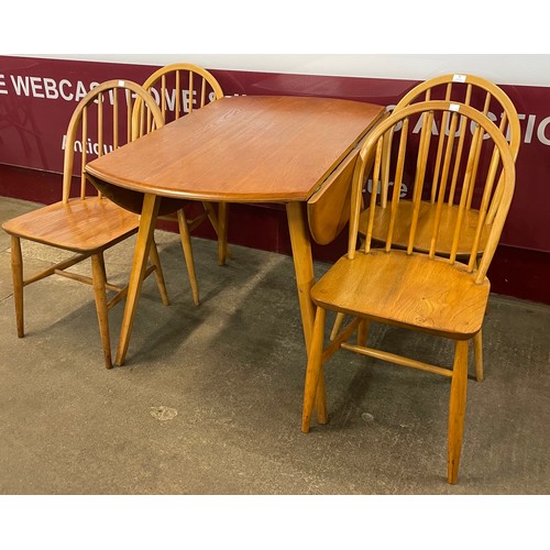 55 - An Ercol Blonde elm and beech Windsor drop-leaf table and a set of four Windsor chairs