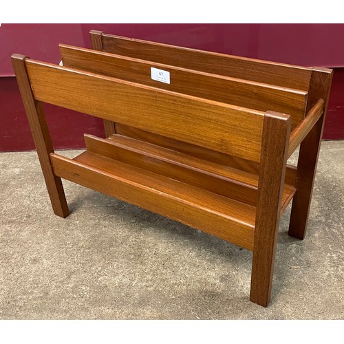 67 - A teak magazine rack