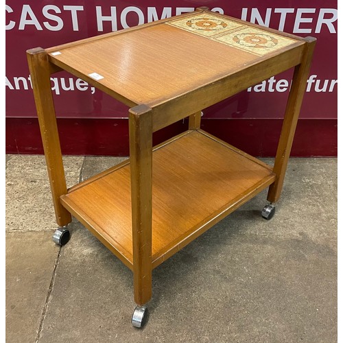 79 - A teak and tiled topped cocktail trolley