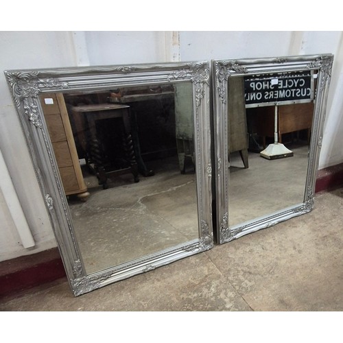 291 - A pair of Fench style silver effect framed mirrors