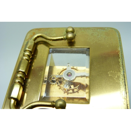 2020 - A Matthew Norman brass carriage clock with carry handle, no key, 11cm