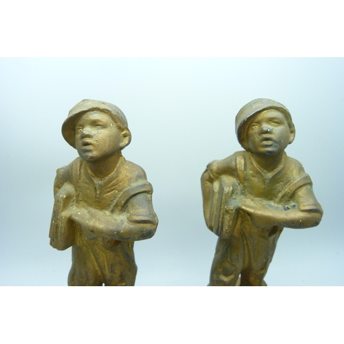 2031 - Two identical bronzed cast iron figures of News Boys, titled 'Speshul', 18cm