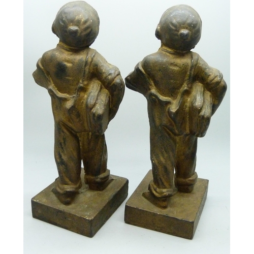 2031 - Two identical bronzed cast iron figures of News Boys, titled 'Speshul', 18cm