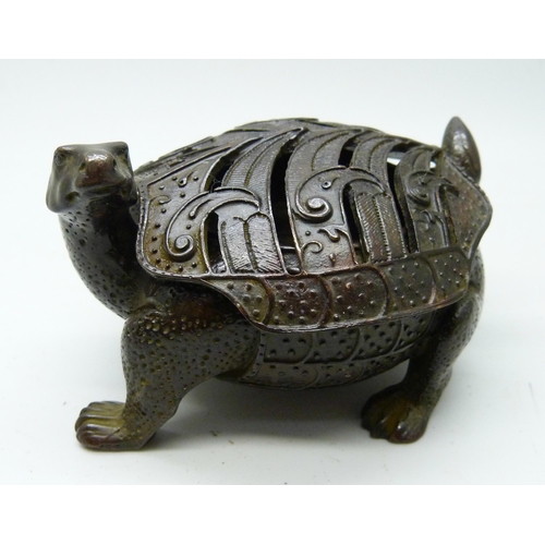 2032 - A Chinese bronze small tortoise figure with character mark to base