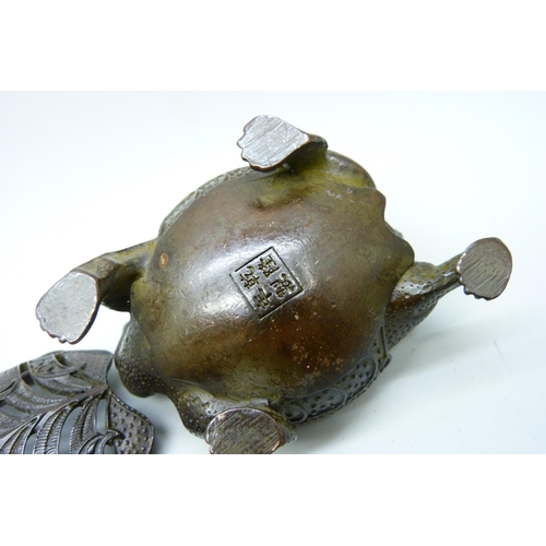 2032 - A Chinese bronze small tortoise figure with character mark to base