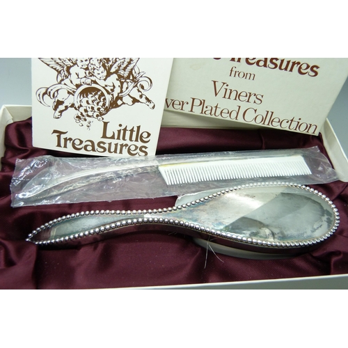 2041 - A Viners 'Little Treasures' silver plate brush and comb set with silver plated egg cup and spoon, bo... 