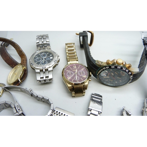 2058 - A collection of lady's and gentleman's wristwatches; Boss, Fossil, Citizen, Nautica, etc.