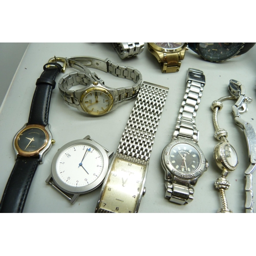 2058 - A collection of lady's and gentleman's wristwatches; Boss, Fossil, Citizen, Nautica, etc.